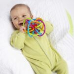 Manhattan Toy Winkel Rattle & Sensory Teether Toy, Blue/Inexperienced/Orange, ... - Image 3